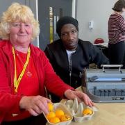 Braille user Glynda Davison with Braille Buddies coordinator Abiola Olabode