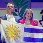 Yamandu Orsi, candidate for the Broad Front (Frente Amplio) and running mate Carolina Cosse celebrate after polls closed in the presidential run-off election in Montevideo (AP/Natacha Pisarenko)