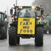 Farmers protested against the scheme at the Senedd in February (Andrew Matthews/PA)