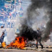 Protests engulfed the country after the opposition rejected the results of the country’s polls which saw the Frelimo party extend its 58-year rule (AP)